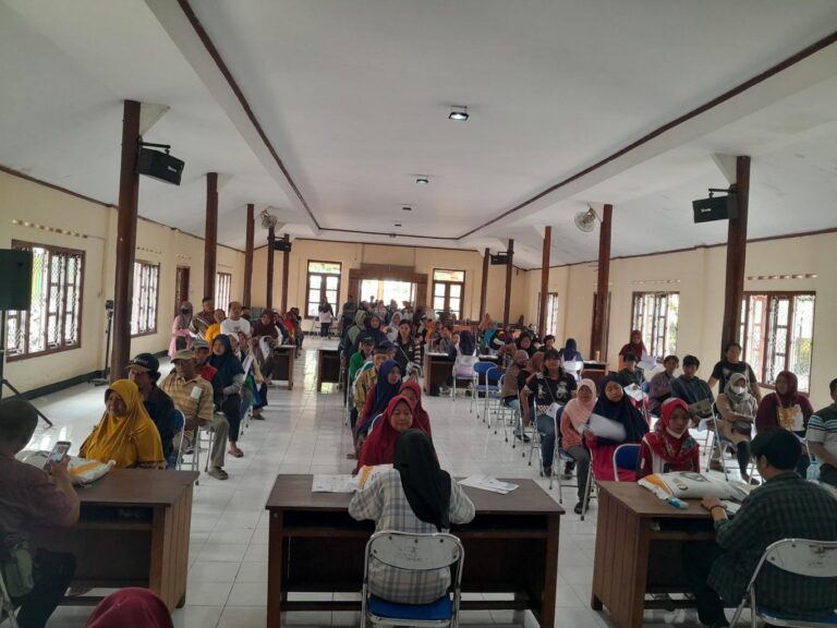 gambar_Penyaluran Bantuan Bansos Beras CPP Kalurahan Pandowoharjo